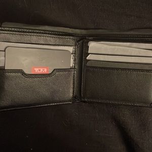Men’s Black Tumi billfold wallet